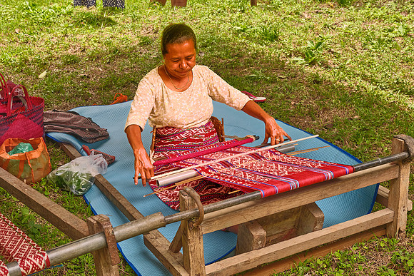 Weaving the village's cloth