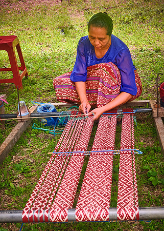 Weaving the village's cloth