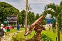 An anti-aircraft gun stands along the path to the memorial forest