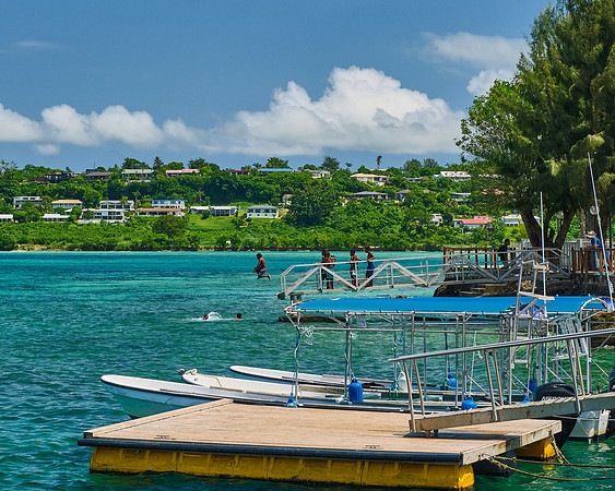 Kids Swimming in Harbor