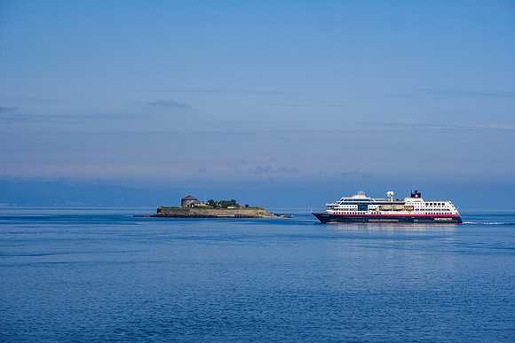 MS Midnatsol leaving Trondheim, Norway.